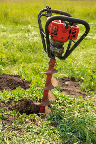 Wallpaper Mural Worker drills the ground at the construction site Torontodigital.ca
