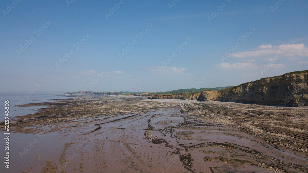 Rocky Jurrasic beach near Kilve Somerset England with many fossils 