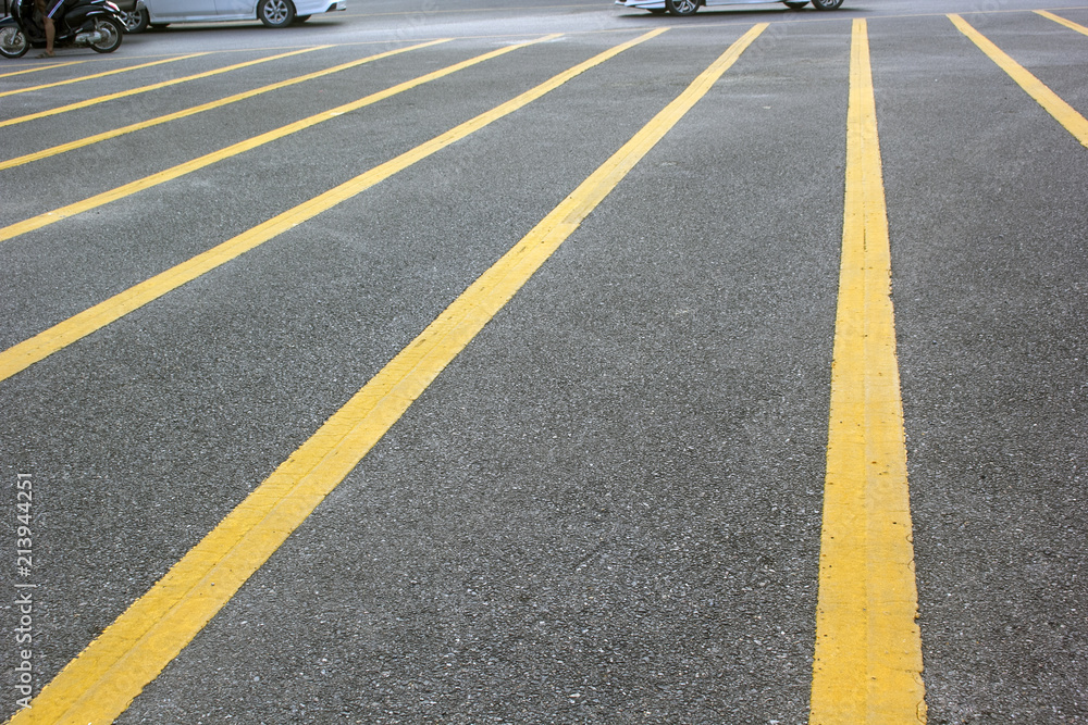 Yellow lines in the concrete road.