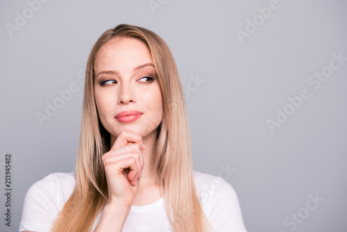 Portrait of young caucasian, charming, attractive nice gorgeous curious girl. Isolated over grey background, copy space