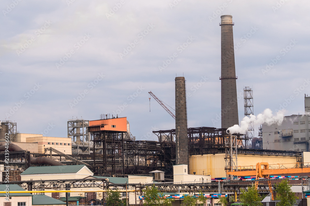 Metallurgical works with smoke. Industrial architecture Metallurgical works with smoke. Industrial architecture