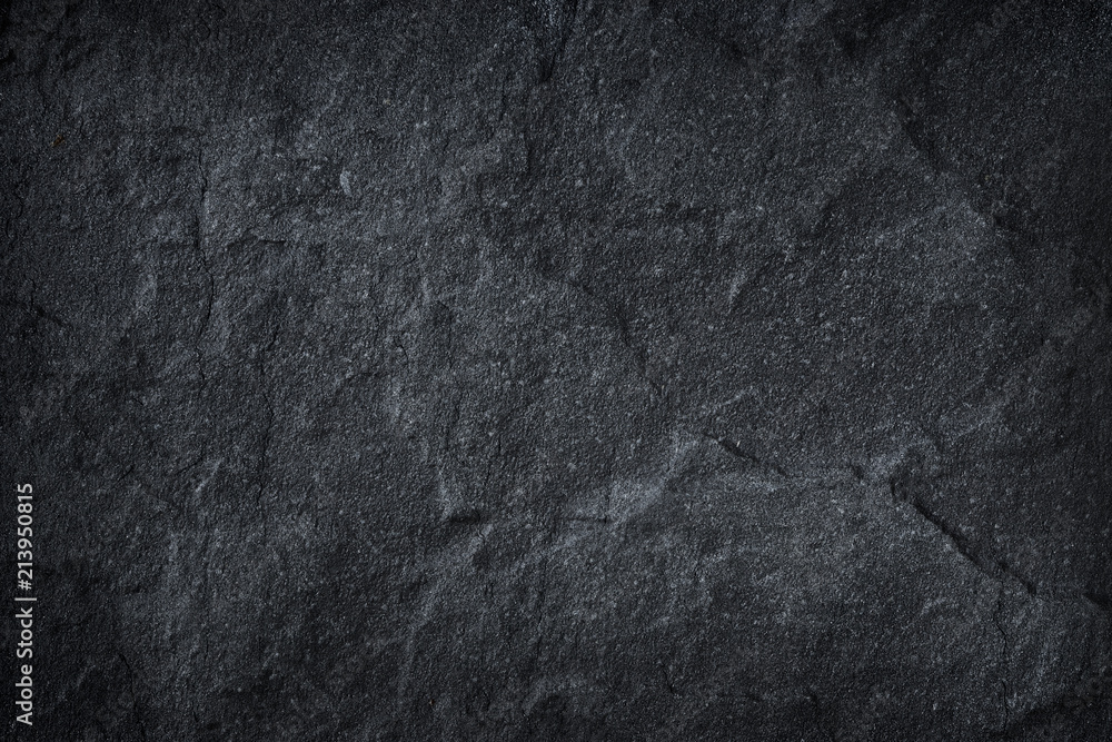 Dark grey black slate stone background or texture