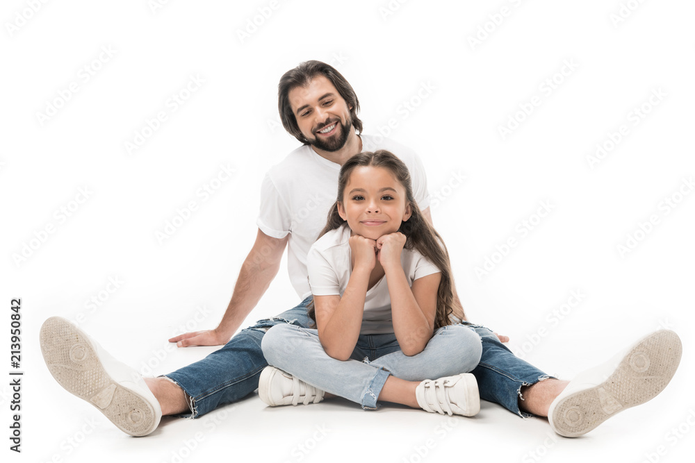 cheerful father and little daughter in white shirts and jeans isolated on white cheerful father and little daughter in white shirts and jeans isolated on white