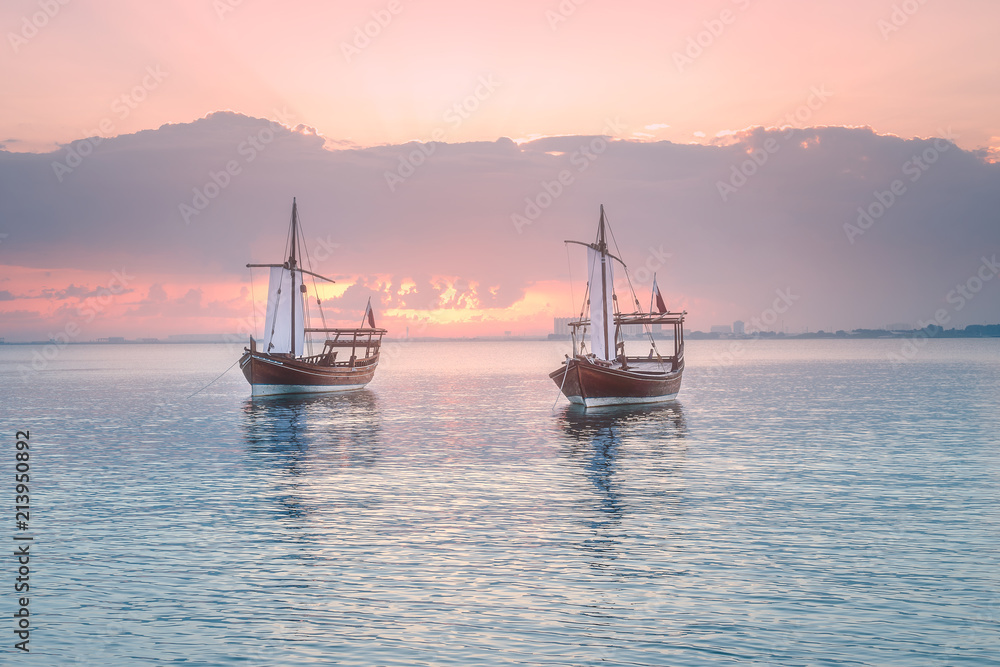 Fototapeta premium Traditional Arabic Dhow boats in Doha harbour