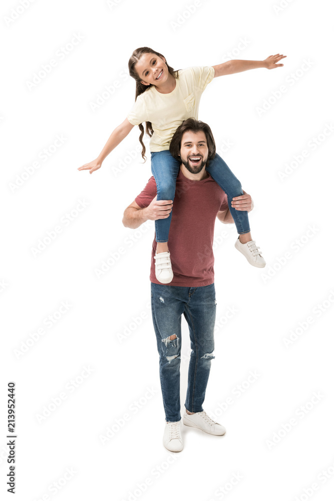 cheerful daughter sitting on fathers neck isolated on white