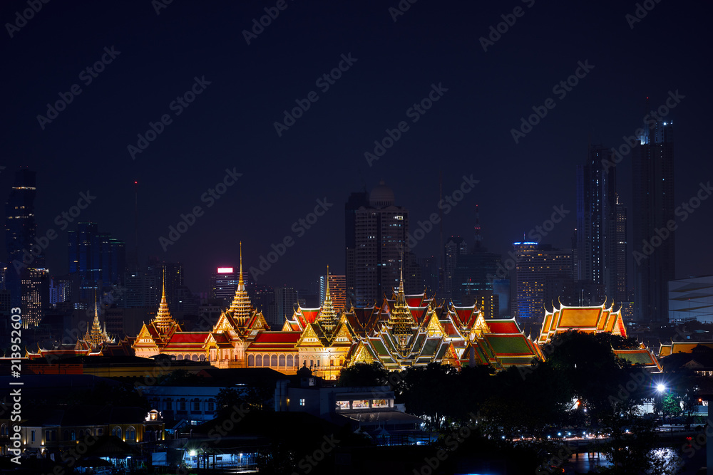 Night view of royal grand palace with cityscape background