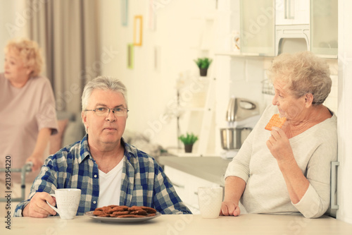 Senior people having breakf...