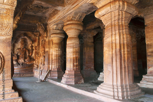 Cave 3   Carved figures of Vishnu seated on a hooded serpent called Sesha or Ananta on the eastern side of the verandha. Badami Caves  Karnataka.
