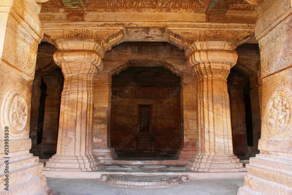 Cave 3 : The verandah itself. It is 7 feet, 2.1 m, wide and has four free-standing, carved pillars separating it from the hall. Badami Caves, Karnataka.