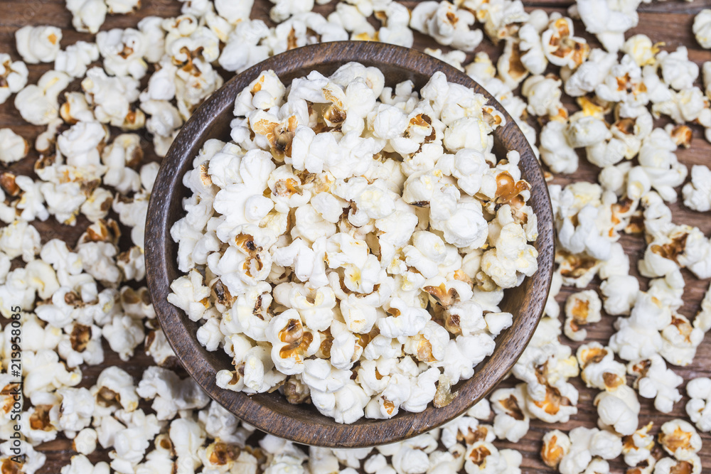 Salt popcorn on the wooden table, Salt popcorn on the wooden table,