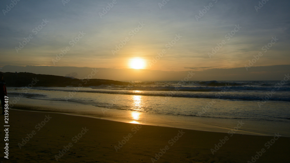 Sunset, Arabian Se, Kerala is a state in South India on the Malabar Coast. Kovalam Beach