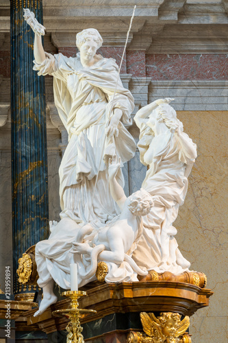 The white marble statue at the front altar in Gustaf Vasa church, Stockholm, Sweden photo