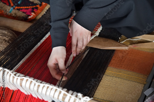 Hands of an arabian weaver