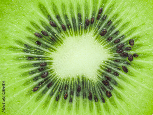 Slice of fresh juicy delicious and healthy kiwi fruit, close up