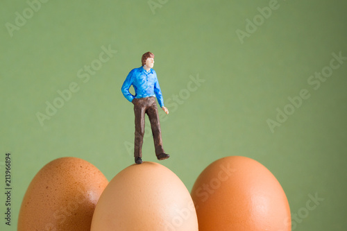 Walking on Eggshells - model figure on top of eggs