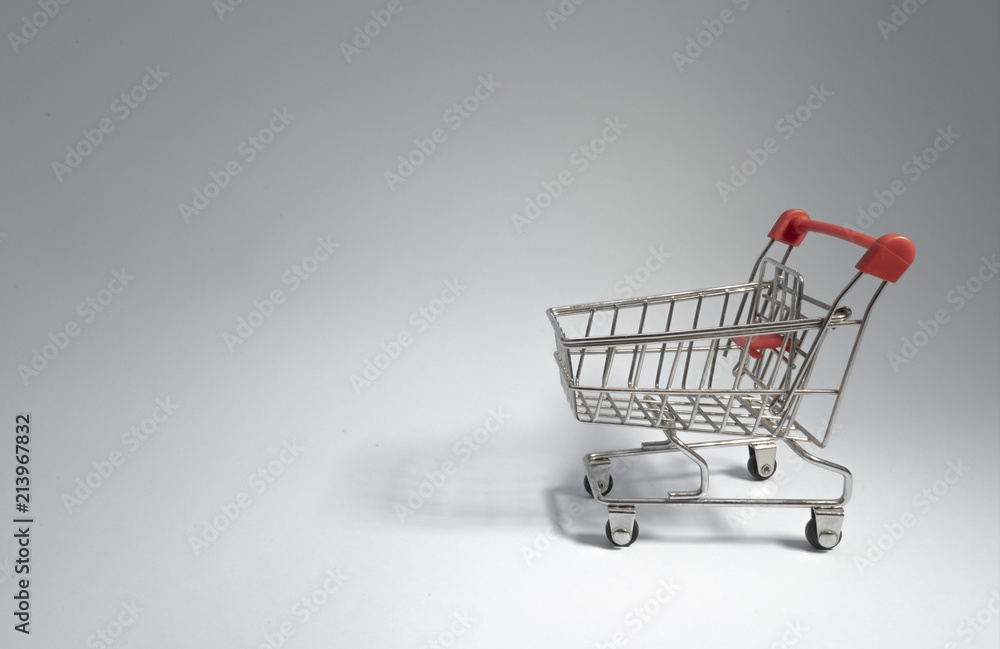 Shopping cart on gray background Shopping cart on gray background