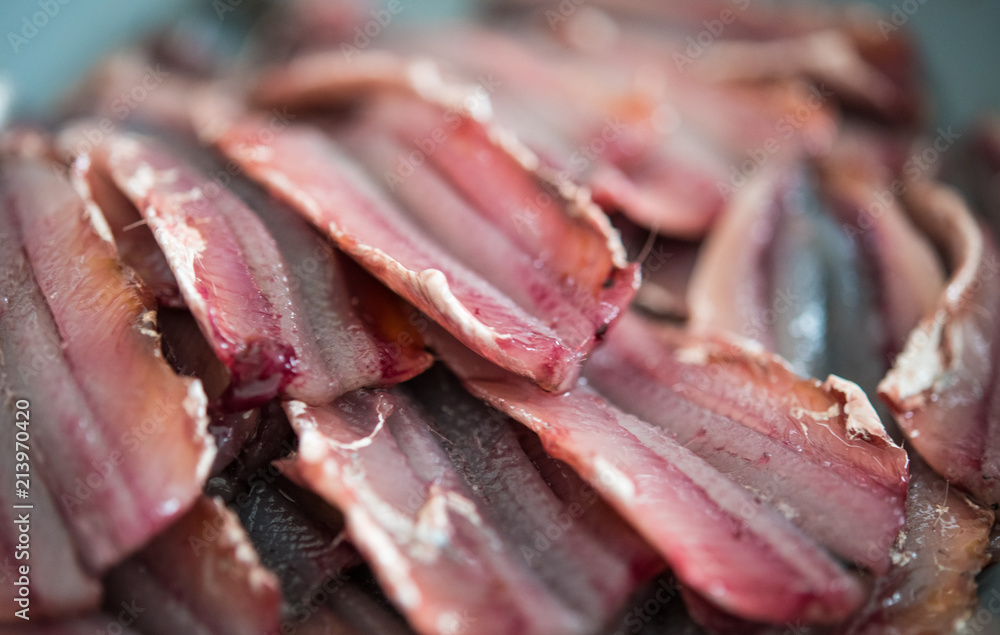 Anchovies fish fillets large group close up Anchovies fish fillets large group close up