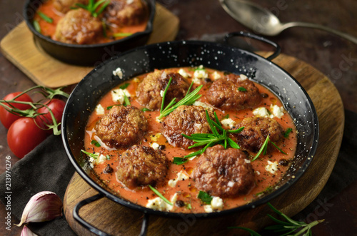 Meatballs in sweet and sour tomato sauce