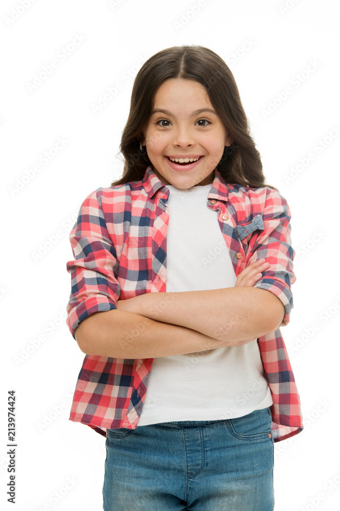 Happy child keep arms crossed isolated on white. Little girl with cute smile and brunette hair. Casual look and fashion. Beauty salon. I am a fashion girl Happy child keep arms crossed isolated on white. Little girl with cute smile and brunette hair. Casual look and fashion. Beauty salon. I am a fashion girl