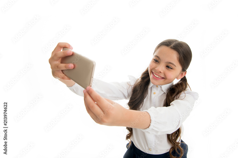 selfie mania. perfect selfie. little girl makes selfie on smartphone. selfie mania and weblog of little girl. stay online. selfie mania. perfect selfie. little girl makes selfie on smartphone. selfie mania and weblog of little girl. stay online.