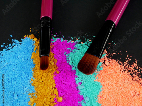 Professional make-up brush on rainbow crushed eyeshadow