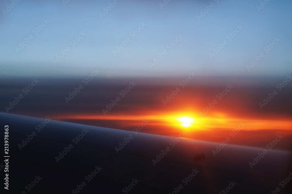 The colorful sunset from an airplane view