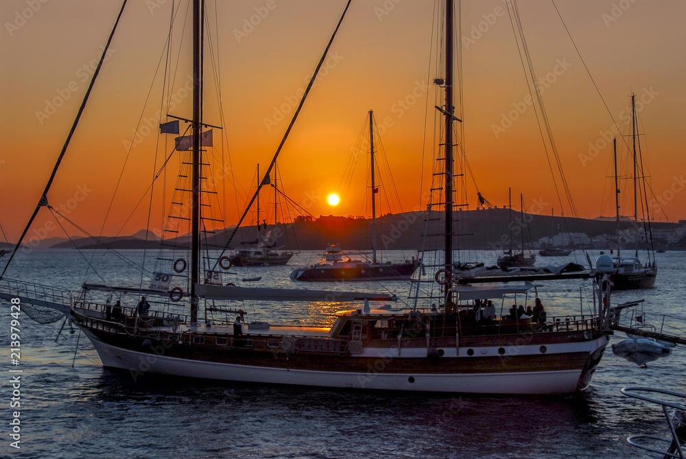 Bodrum, Turkey, 23 October 2010: Bodrum Cup Races, Gulet Wooden Sailboats with Sunset