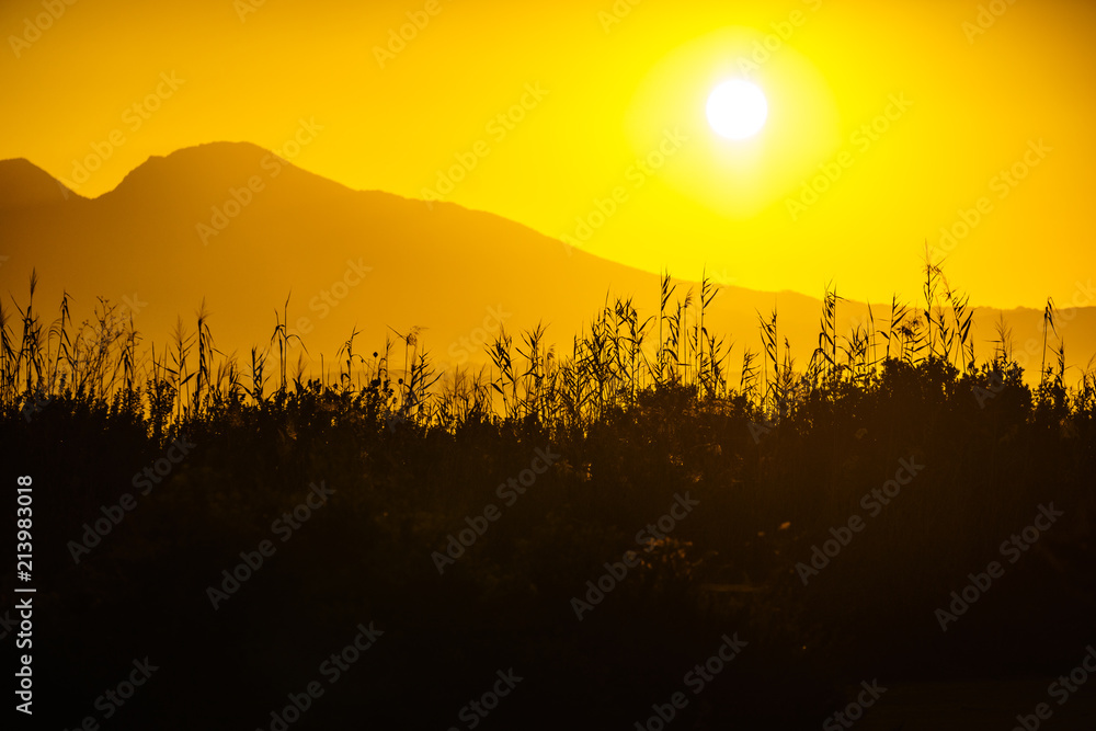 Obraz premium Sunrise over mountain hill