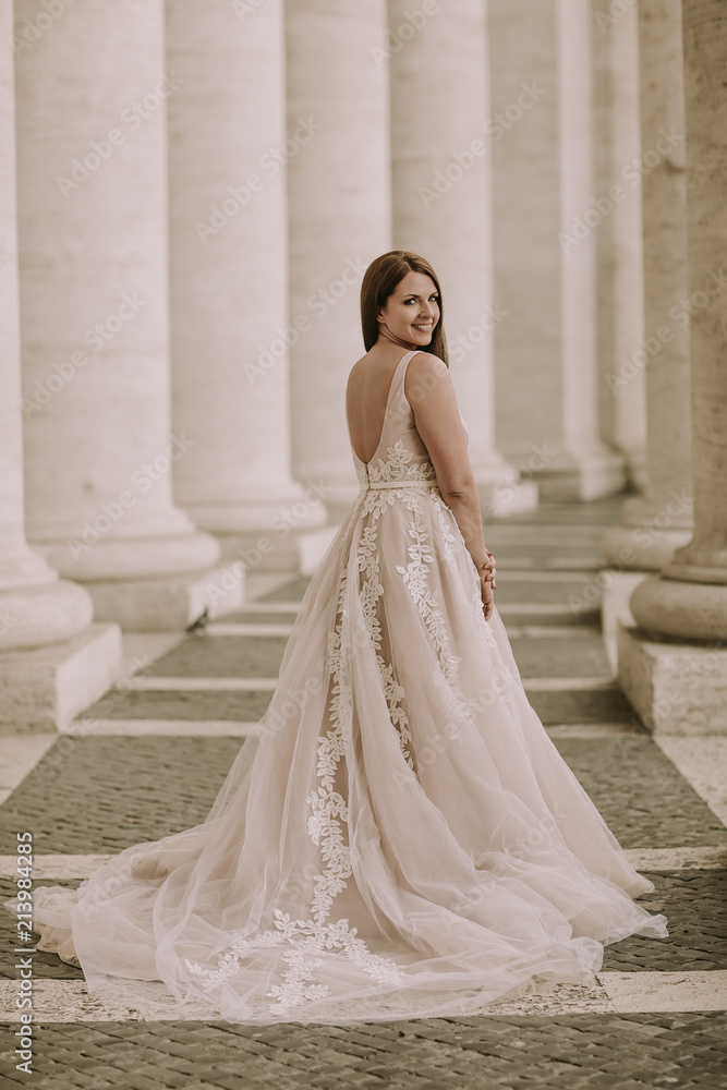 Pretty young bride in wedding dress in the Vatican Pretty young bride in wedding dress in the Vatican