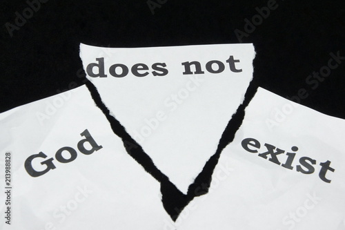 Atheism. Doubt in the faith. Sheet of paper with the inscription.
