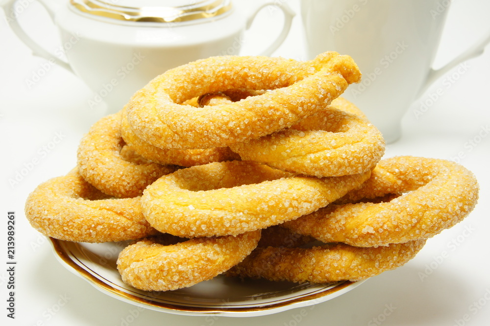 Breakfast. Sweet cookies on a background of dishes. Breakfast. Sweet cookies on a background of dishes.