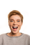 Head portrait of young beautiful surprised woman amazed in shock and surprise with mouth big opened isolated white background in astonished face expression