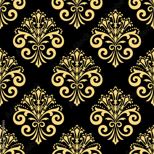 Wallpaper in the style of Baroque. Seamless vector background. Black and gold floral ornament. Graphic pattern for fabric, wallpaper, packaging. Ornate Damask flower ornament