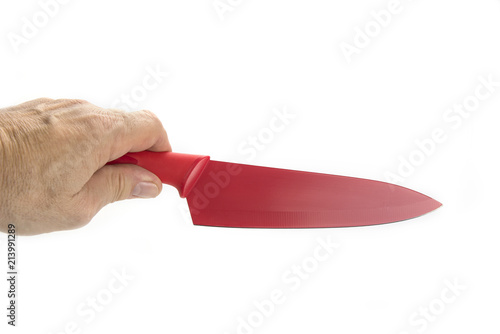 Quality kitchen sharp knife in red on the white in hand
