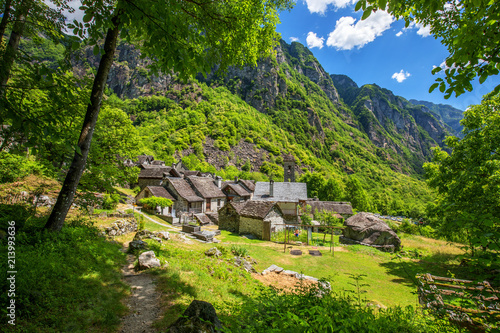 Forogio village with typical stone houses and Swiss Alps, Bavona valley, Ticino, Switzerland photo