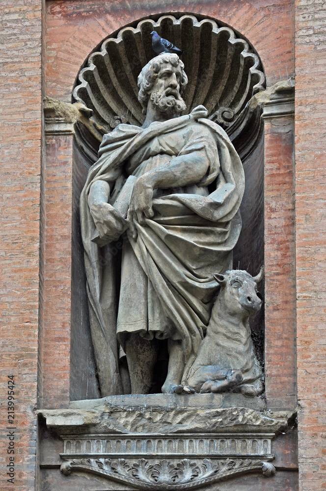 Italy, Bologna Saint Luke evangelist statue attributed to Giovanni Tedeschi  in the front of Santissimo Salvatore church.