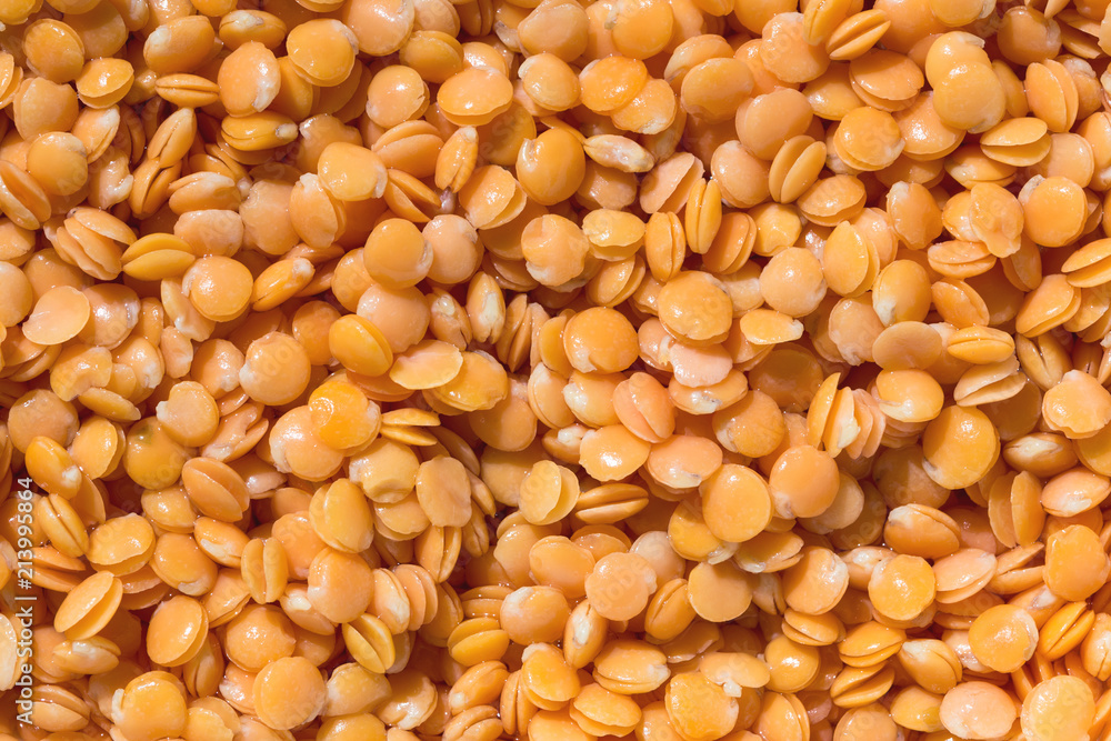 Red lentils texture background. Close-up healthy organic lentil seed. Natural nutriotion diet