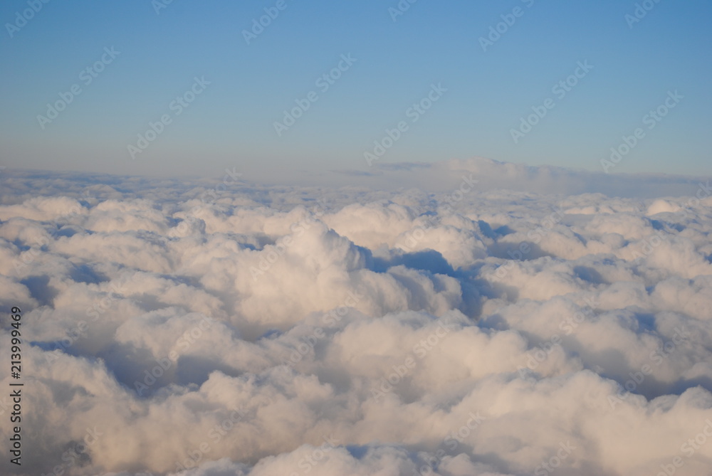 Skies- flying above fluffy clouds