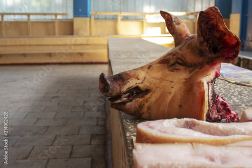 Pork head in the market. Meat from an organic farm. photo