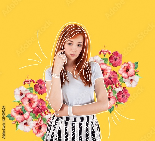 Thoughtful flower arranger. Experienced professional flower arranger thoughtfully touching her face and looking into the distance while standing alone in a flower shop photo