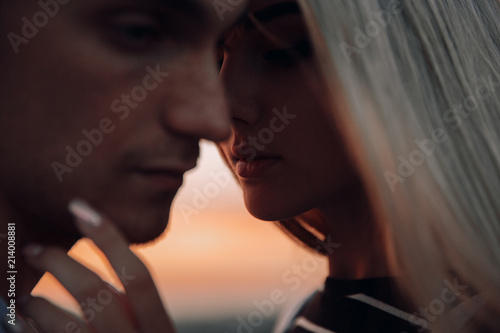 Loving couple.Couple in love.Together.Couple at sunset.Sunset.Love.Feeling.Tenderness.Silhouette photo