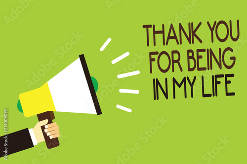 Conceptual hand writing showing Thank You For Being In My Life. Business photo showcasing loving someone for being by your side Man holding megaphone green background message speaking loud. © Artur