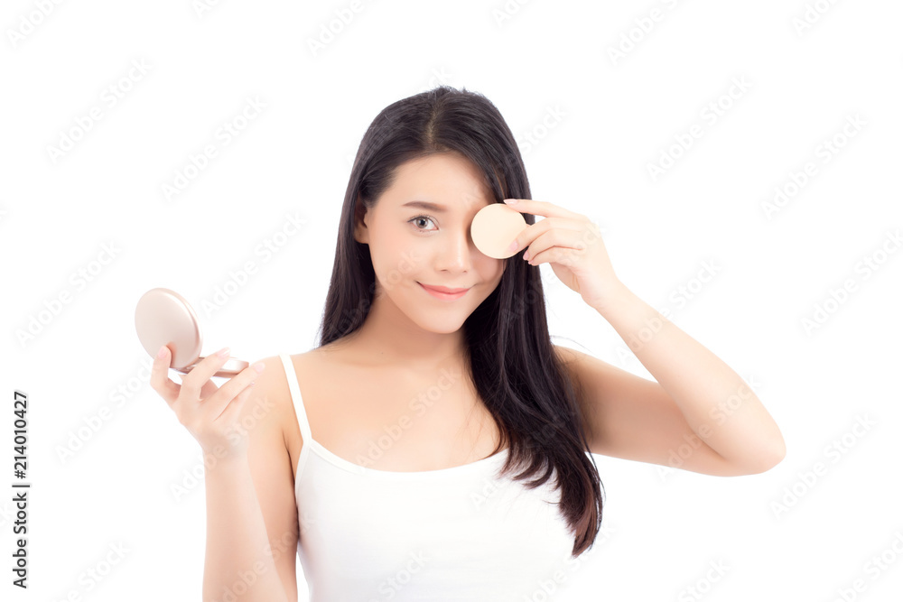 Portrait of beautiful asian woman applying powder puff at cheek makeup of cosmetic, beauty of girl with face smile isolated on white background, wellness and healthcare concept. Portrait of beautiful asian woman applying powder puff at cheek makeup of cosmetic, beauty of girl with face smile isolated on white background, wellness and healthcare concept.