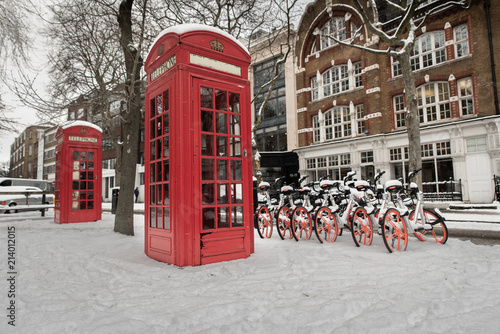 Red Telephone box in a snowy London Street