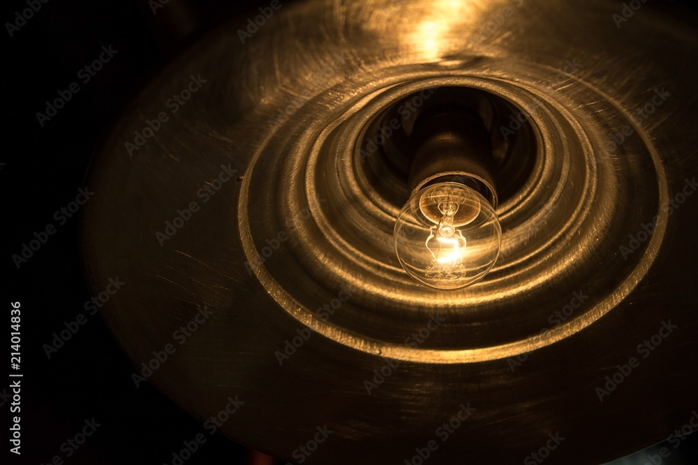 Light bulb illuminated and taken from above. Light bulb illuminated and taken from above.