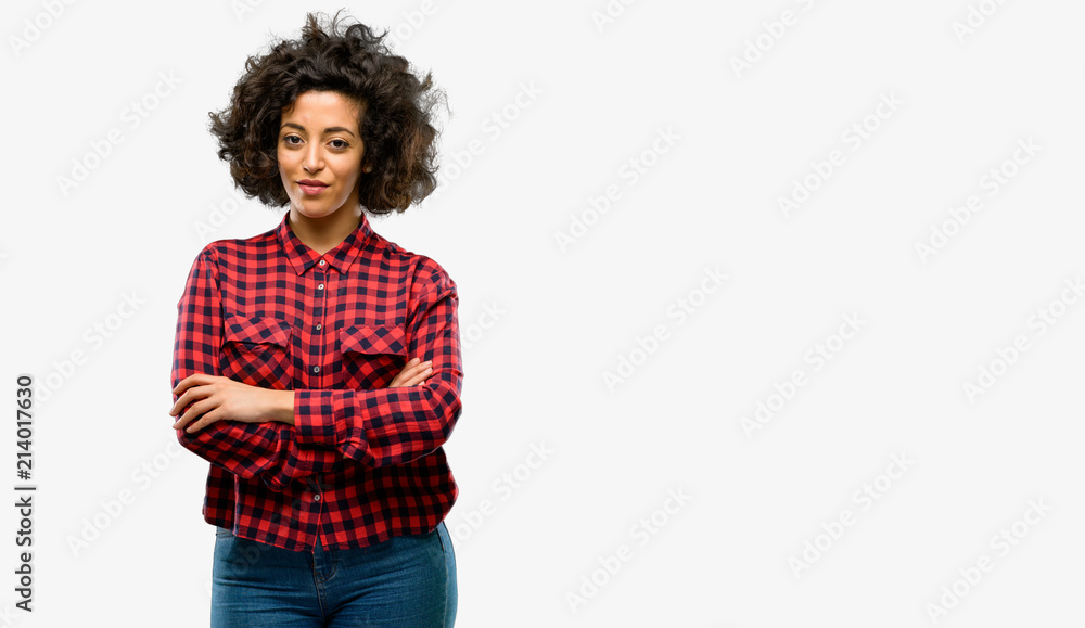 Beautiful arab woman with crossed arms confident and happy with a big natural smile laughing Beautiful arab woman with crossed arms confident and happy with a big natural smile laughing