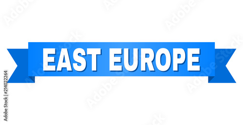 EAST EUROPE text on a ribbon. Designed with white caption and blue stripe. Vector banner with EAST EUROPE tag.