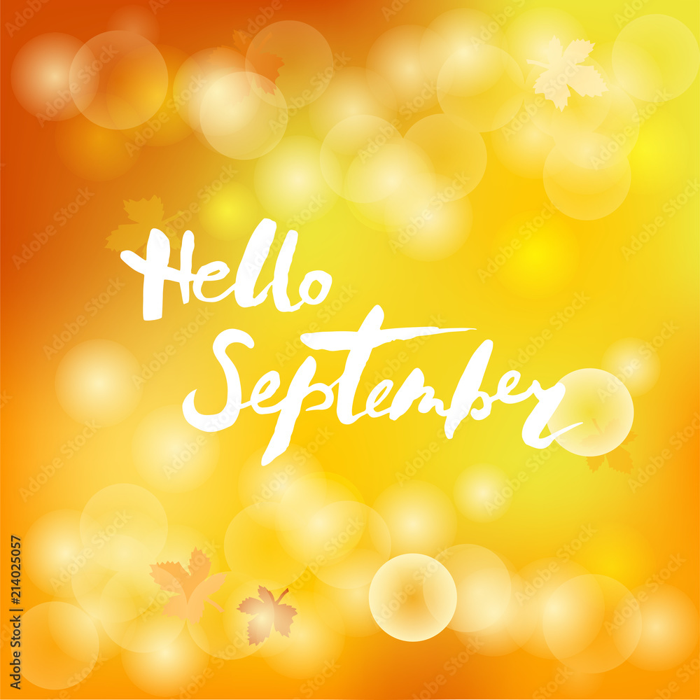 Handwritten lettering Hello September isolated on yellow background.