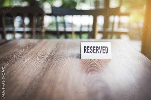 reserved sign on table photo