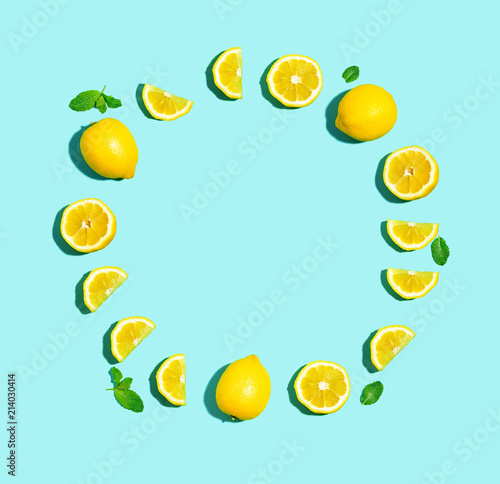 Fresh lemon circle on a pastel blue background flat lay